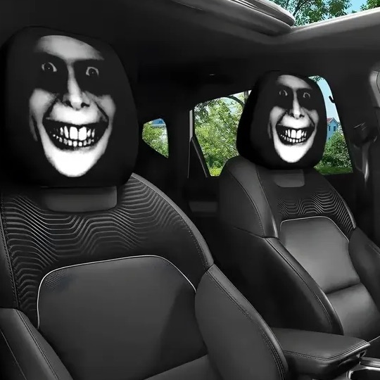 Dark Circles headrest covers with a creepy grin